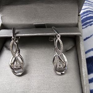 Infinity drop earrings fro. ZALES. Never worn